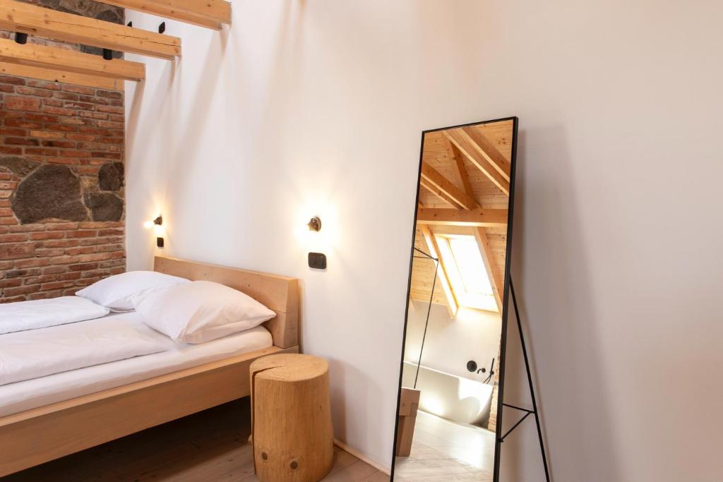 Postel nebo postele na pokoji v ubytování Penzion Kolnička