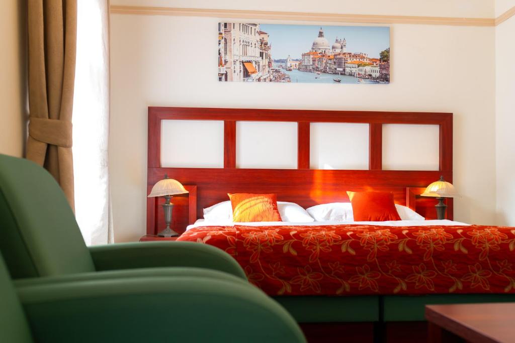 Postel nebo postele na pokoji v ubytování Vivaldi Apartments