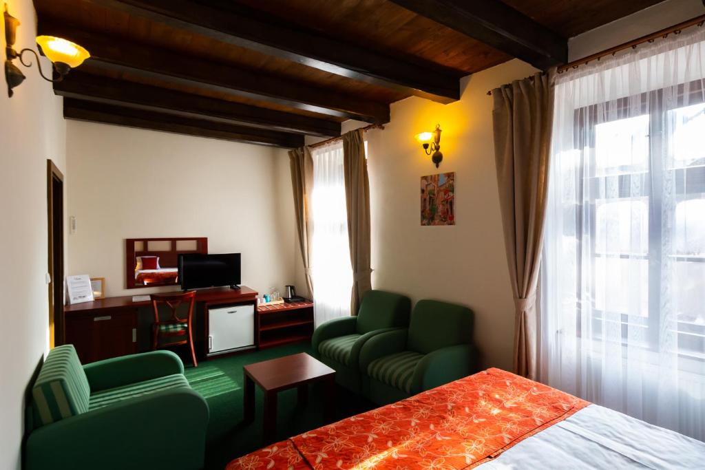 Postel nebo postele na pokoji v ubytování Vivaldi Apartments