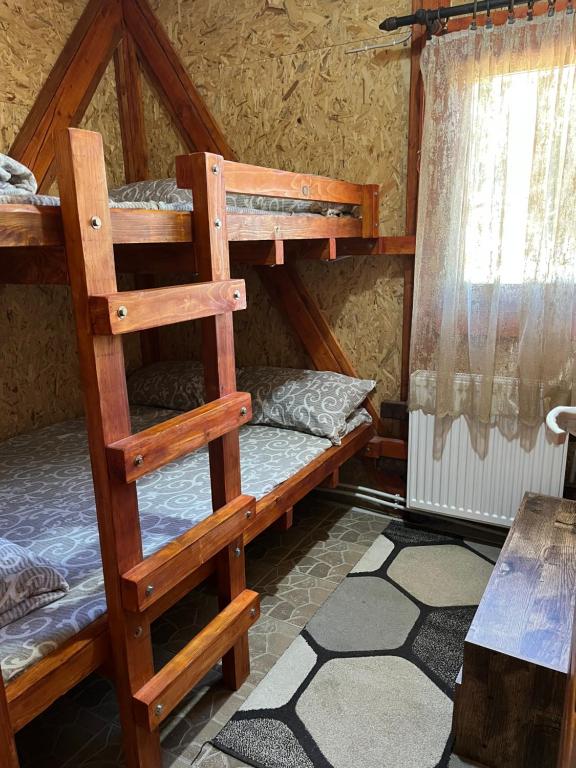Tempat tidur dalam kamar di Vikendica Marković