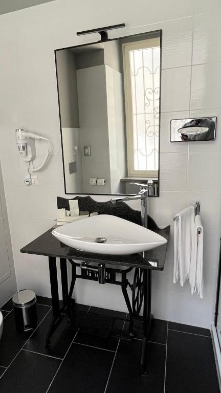 Koupelna v ubytování Borgo Yporegia