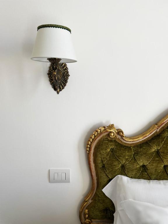 Postel nebo postele na pokoji v ubytování ISOLA - Smart ApartHotel