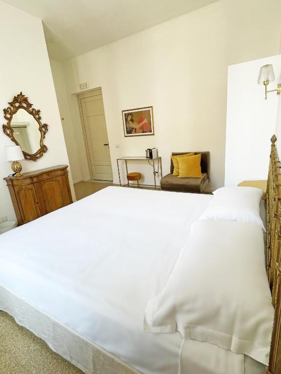 Postel nebo postele na pokoji v ubytování ISOLA - Smart ApartHotel