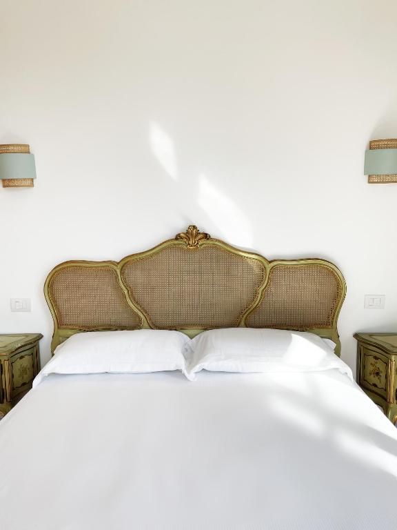 Postel nebo postele na pokoji v ubytování ISOLA - Smart ApartHotel