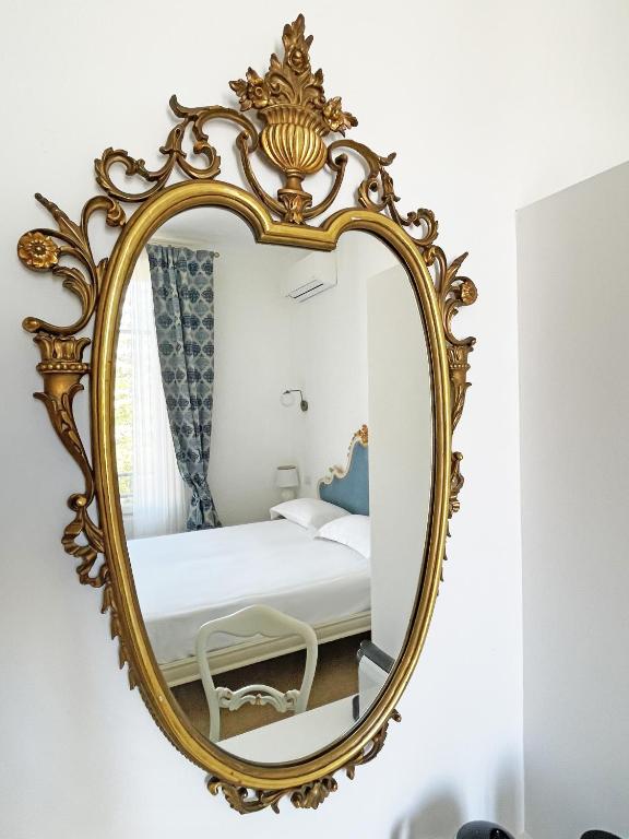 Postel nebo postele na pokoji v ubytování ISOLA - Smart ApartHotel