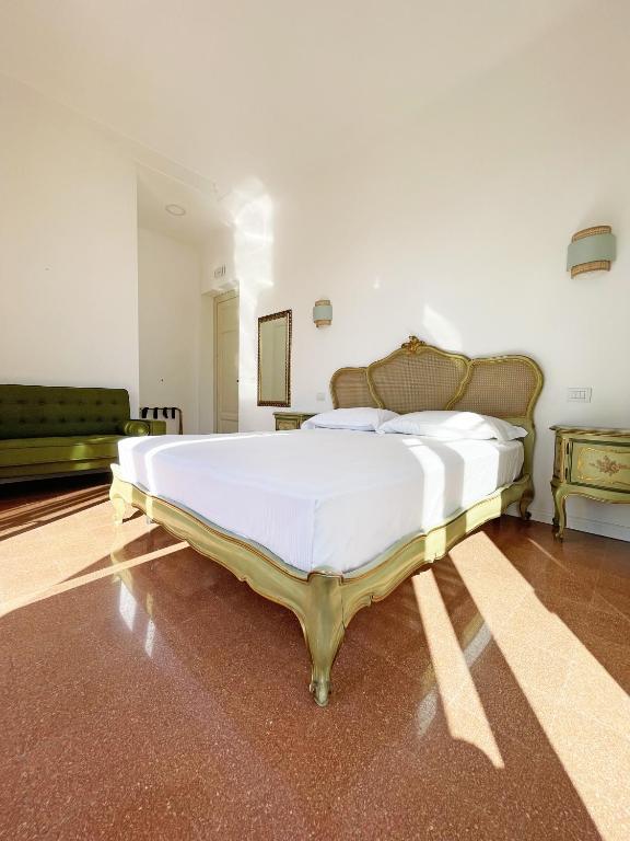 Postel nebo postele na pokoji v ubytování ISOLA - Smart ApartHotel