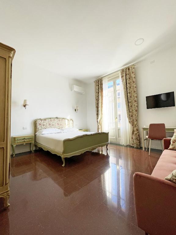 Postel nebo postele na pokoji v ubytování ISOLA - Smart ApartHotel