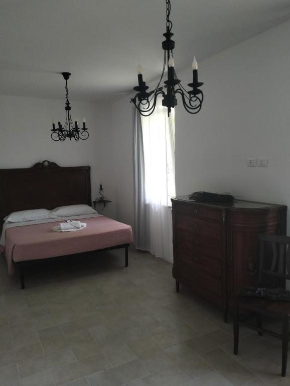 Postel nebo postele na pokoji v ubytování AGRITURISMO TERRAPIA