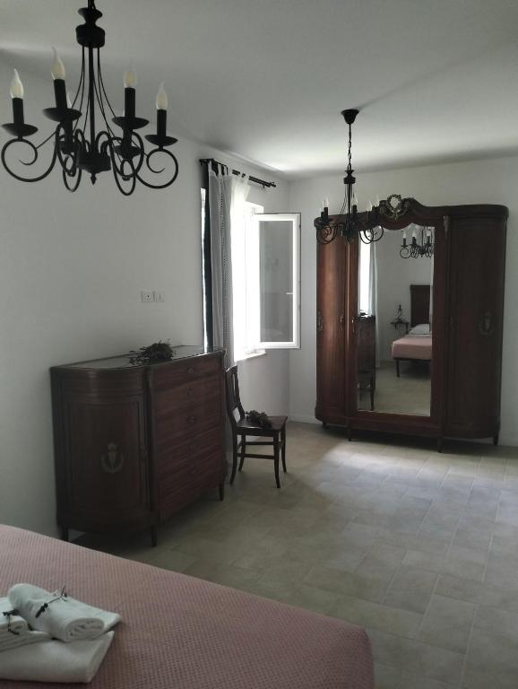 Postel nebo postele na pokoji v ubytování AGRITURISMO TERRAPIA