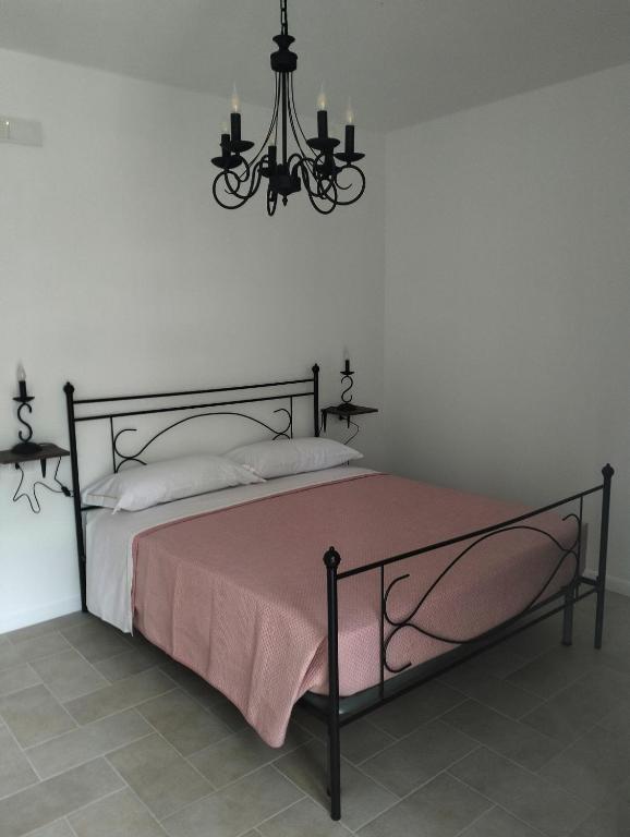 Postel nebo postele na pokoji v ubytování AGRITURISMO TERRAPIA