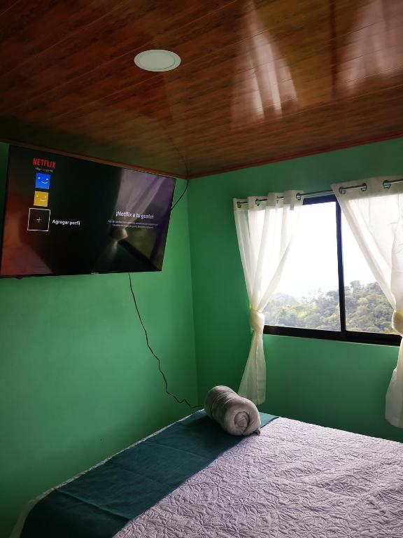 Postel nebo postele na pokoji v ubytování Las Colinas Glamping