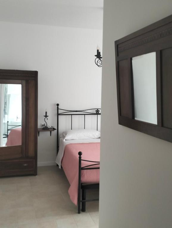 Postel nebo postele na pokoji v ubytování AGRITURISMO TERRAPIA