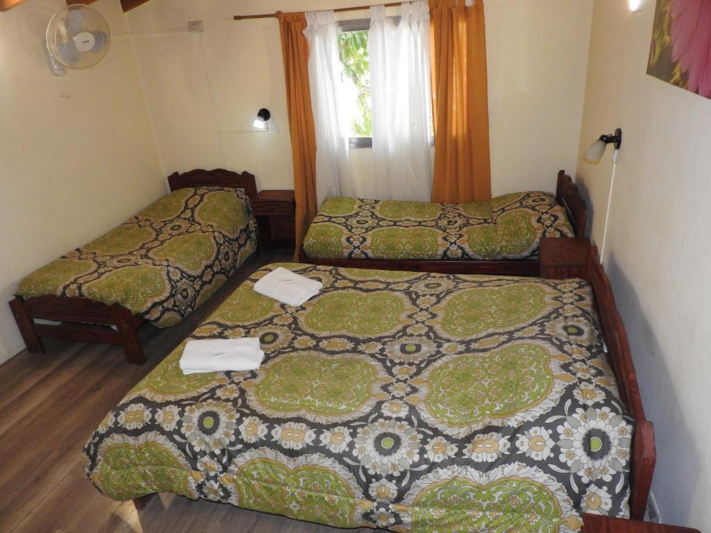 Una cama o camas en una habitación de Los Girasoles team family