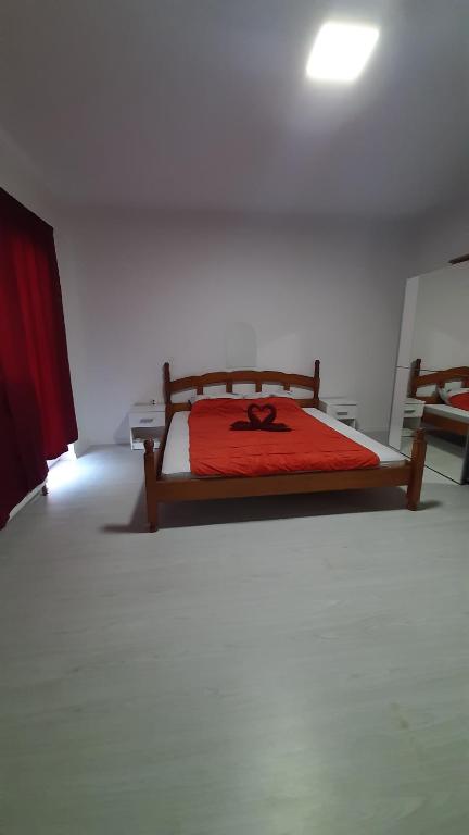 Postel nebo postele na pokoji v ubytování Apartmani Vesna