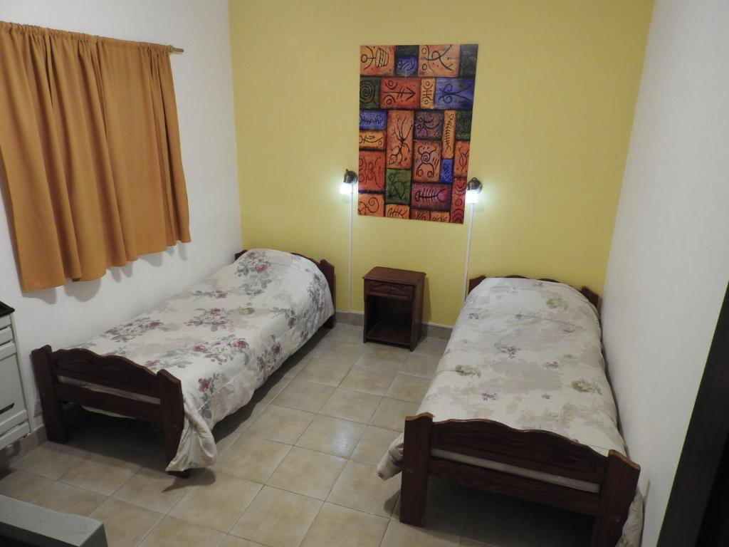 Una cama o camas en una habitación de Los Girasoles team family