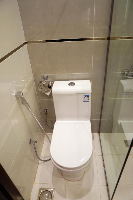 Koupelna v ubytování Oriens Hotel
