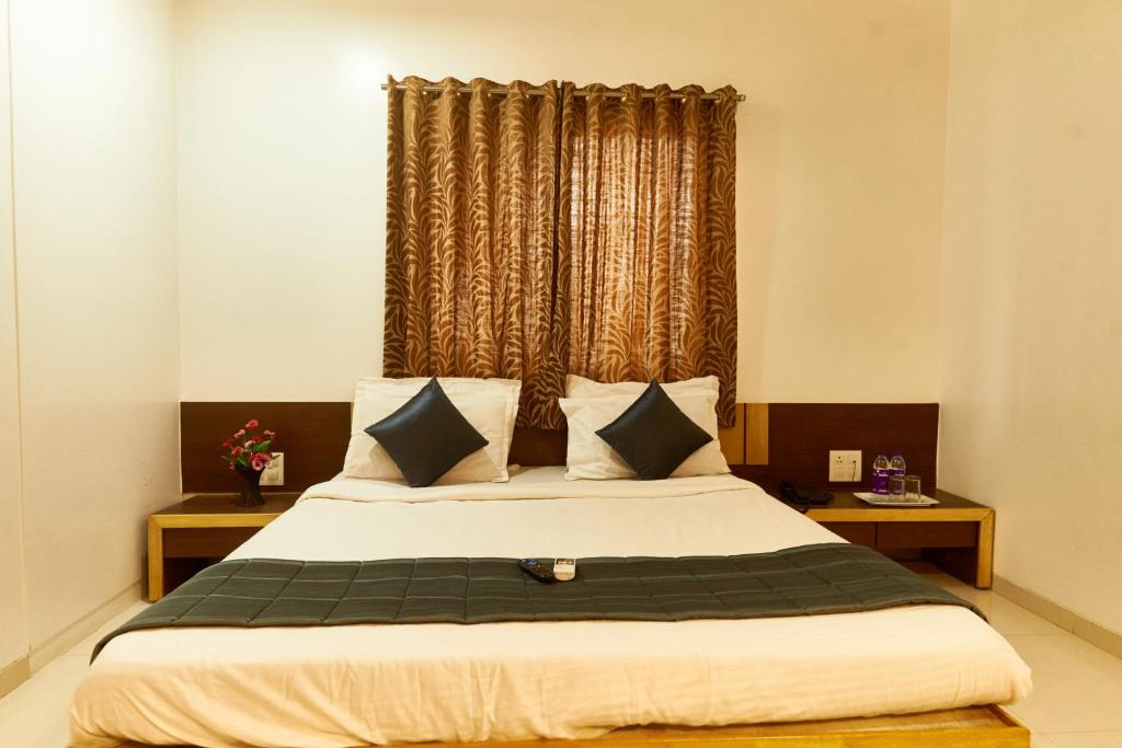 Postel nebo postele na pokoji v ubytování Hotel Anand Heritage