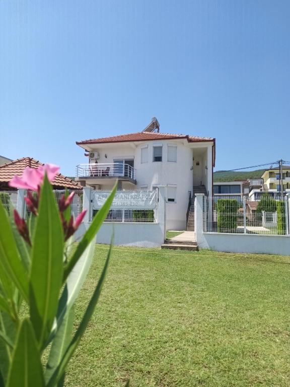 a view of a house from the yard at Krapce - Lake View Apartments in Star Dojran