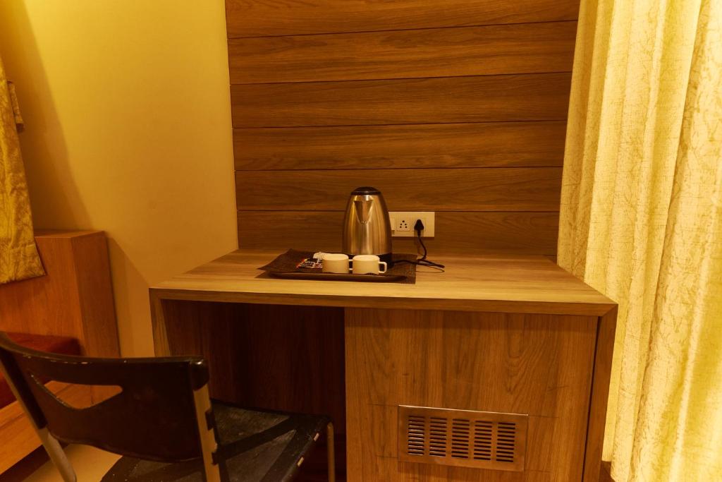 Příslušenství pro přípravu čaje a kávy v ubytování Hotel Anand Heritage