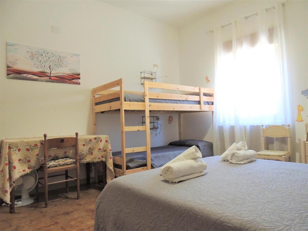 Letto o letti in una camera di Rifugio Porta Nord
