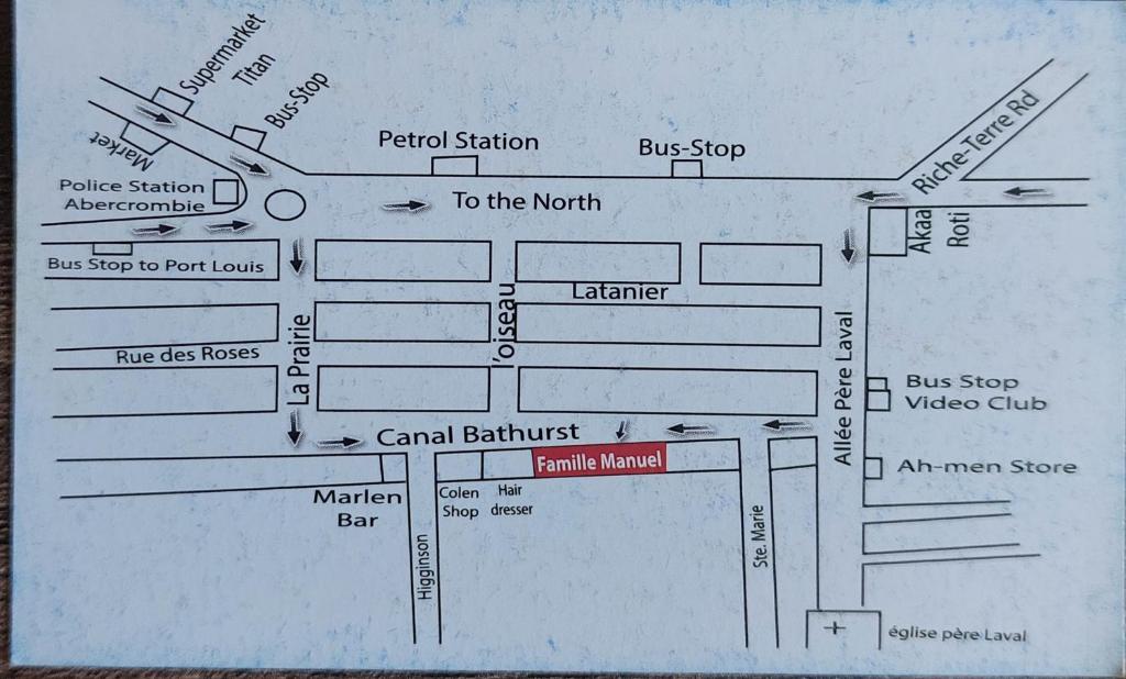 a diagram of a bus stop on a piece of paper at Manuel's Apartment in Port Louis
