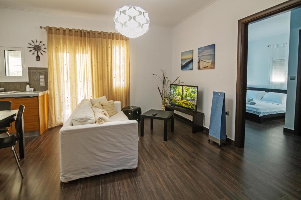 TV a/nebo společenská místnost v ubytování Κτήμα Ζιάκος