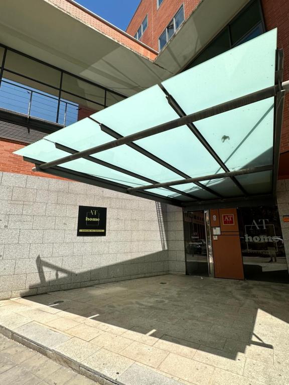 awning over the entrance to a building at AT home Avenida del Ejercito in Guadalajara