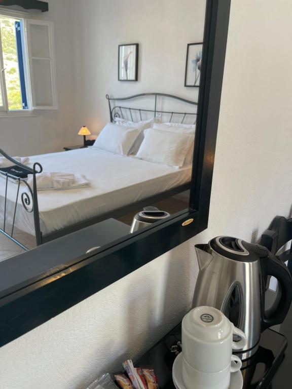 Postel nebo postele na pokoji v ubytování Venikouas Hotel