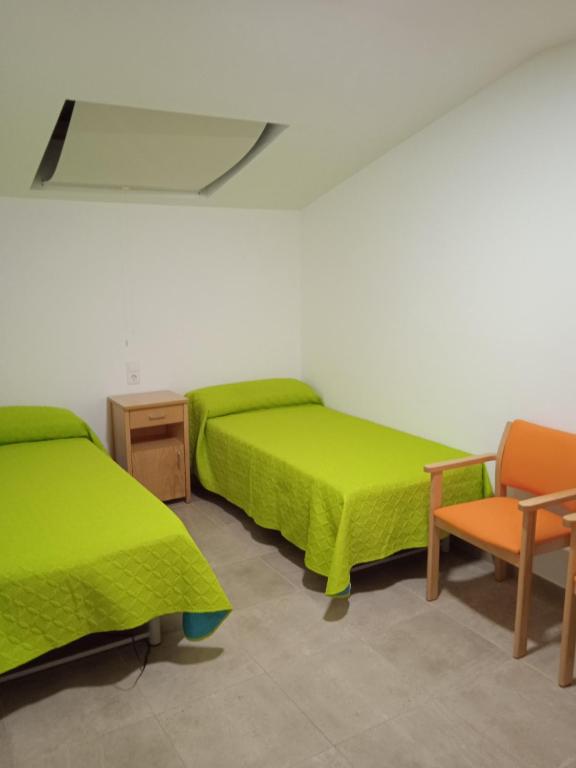 Postel nebo postele na pokoji v ubytování Albergue de Maella