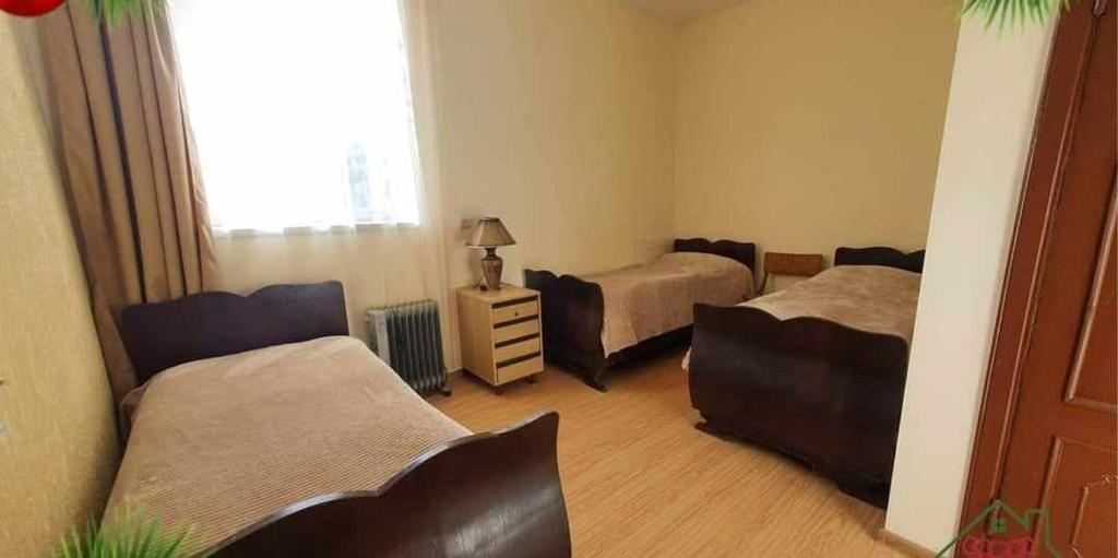 Postel nebo postele na pokoji v ubytování Moreni Guest House