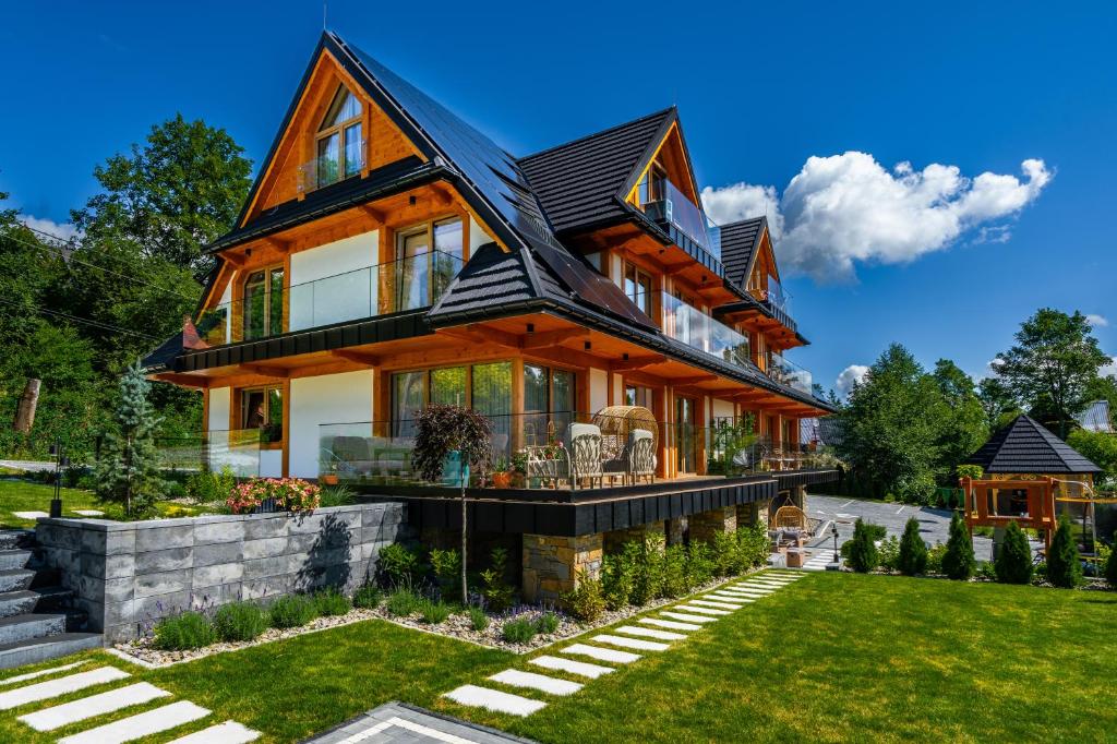 Vonkajšia záhrada v ubytovaní Rezydencja Górska Odkryj Zakopane
