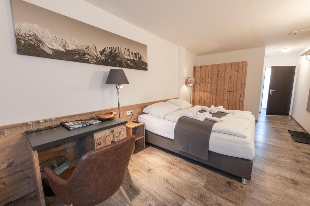 Letto o letti in una camera di Pension Rainer