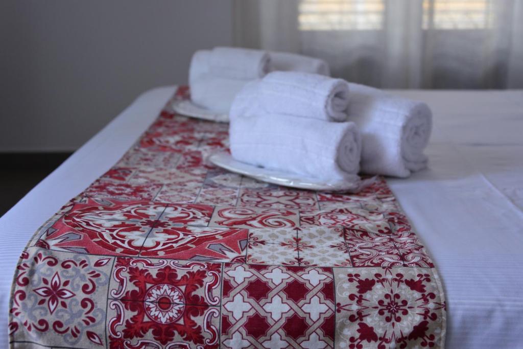 Postel nebo postele na pokoji v ubytování B&B Le Porte Del Centro