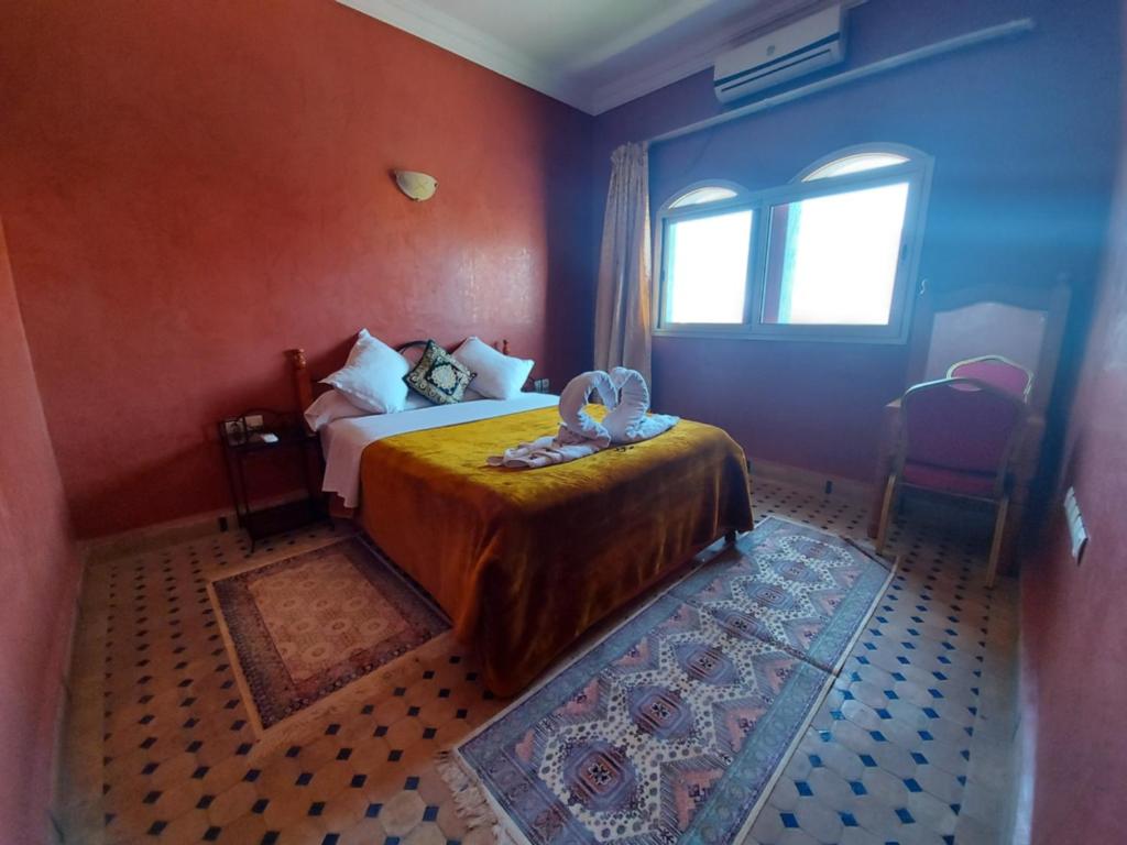 Postel nebo postele na pokoji v ubytování Hotel Marmar