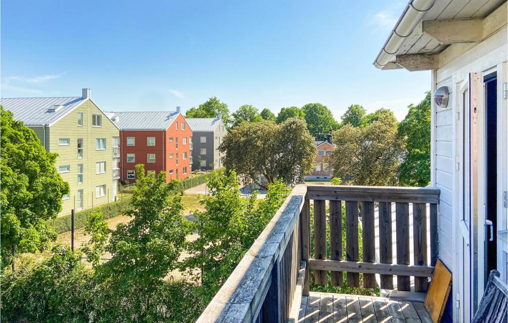 a balcony with a view of a city at 2 Bedroom Amazing Apartment In Visby in Visby