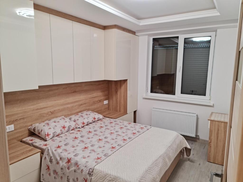 Een bed of bedden in een kamer bij New Apartment Chisinau