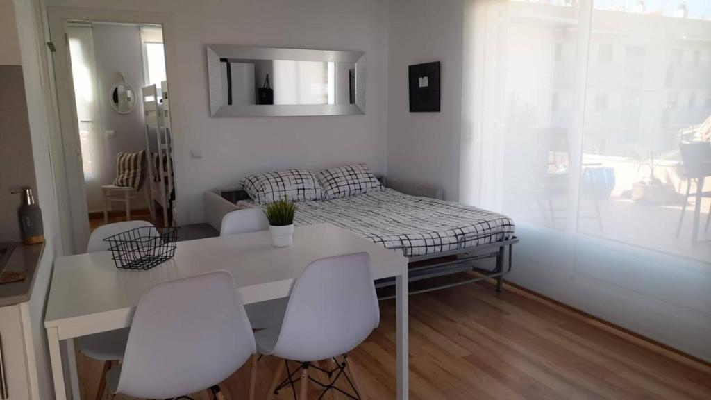 Postel nebo postele na pokoji v ubytování Terrassa-Solarium Centre