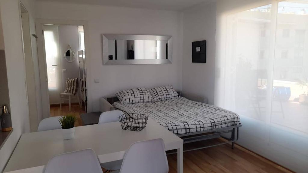 Postel nebo postele na pokoji v ubytování Terrassa-Solarium Centre