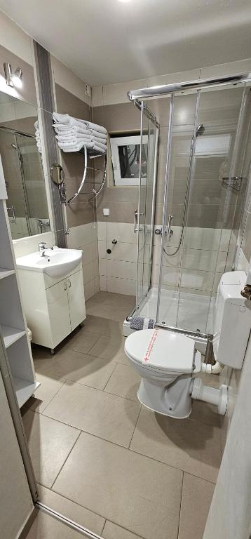 Koupelna v ubytování Hotel Fontana
