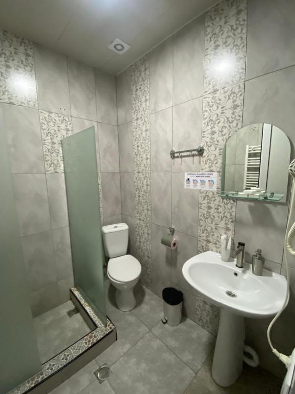 Koupelna v ubytování Hotel Elegant