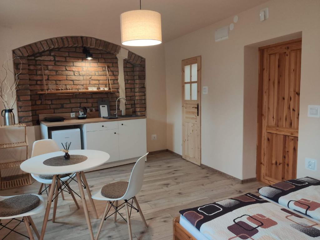 Η κουζίνα ή μικρή κουζίνα στο Apartamenty i pokoje gościnne "Wacuś"