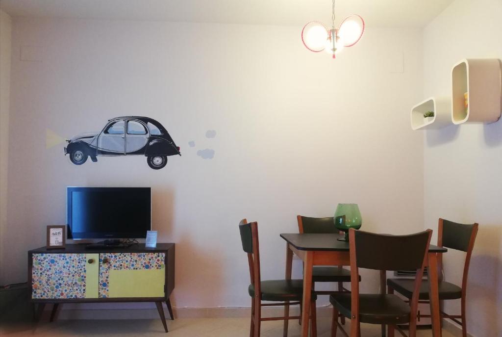 TV a/nebo společenská místnost v ubytování Apartamentos Puenteviejo
