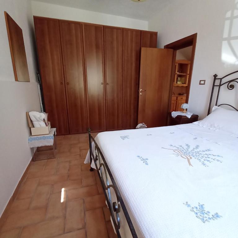 Postel nebo postele na pokoji v ubytování La Casetta