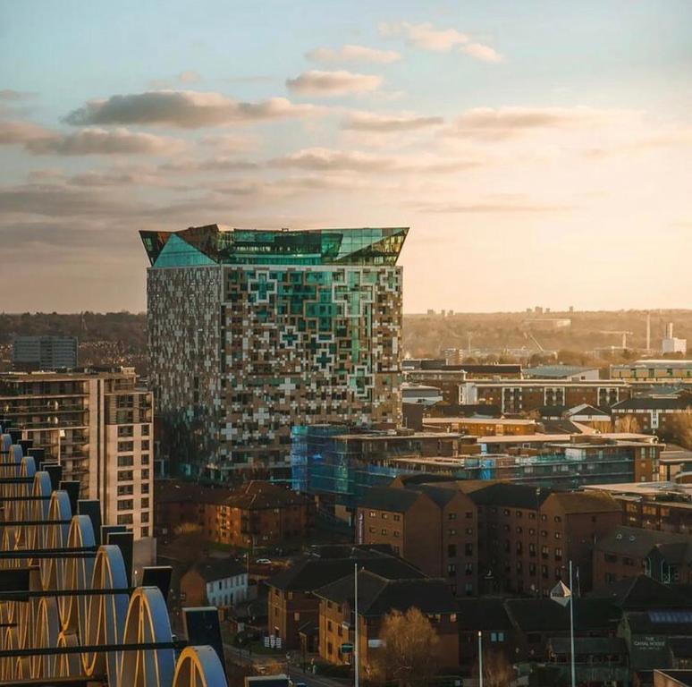 a view of a city with a tall building at The Cube Side Apartments - One Bedroom With Balcony in Birmingham