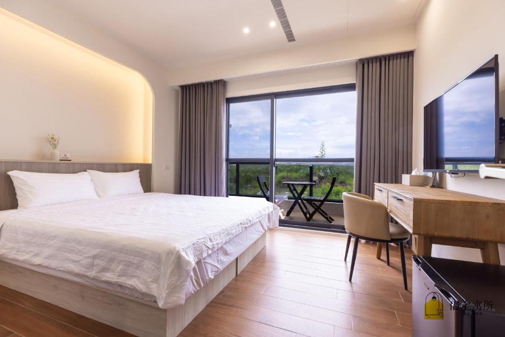 Postel nebo postele na pokoji v ubytování Lu's B&B