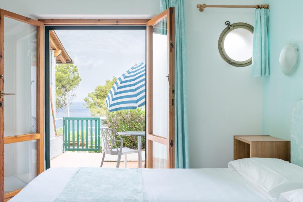 Кровать или кровати в номере Hotel Paradiso