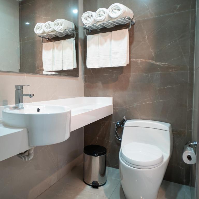 Koupelna v ubytování Bello Hotel