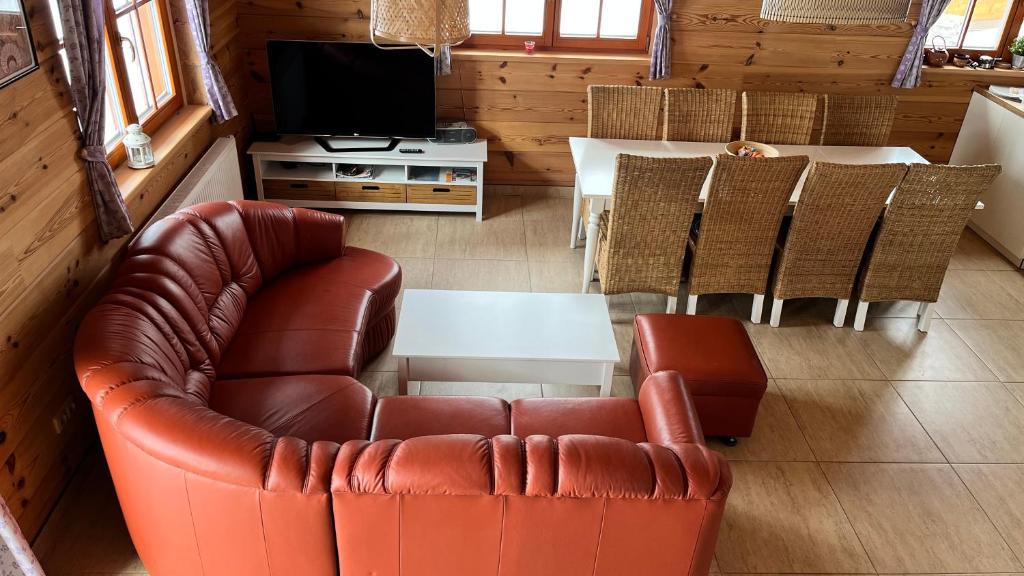 TV a/nebo společenská místnost v ubytování Apartmány Orlice