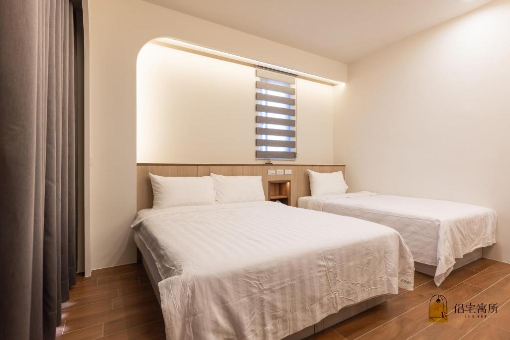 Postel nebo postele na pokoji v ubytování Lu's B&B