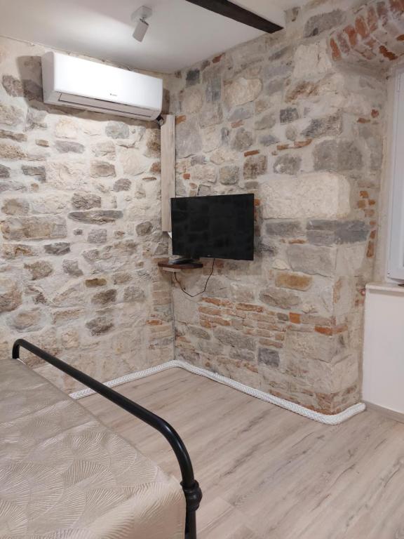 TV a/nebo společenská místnost v ubytování APARTMAN B